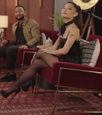 Ariana Grande in hose and heels 