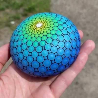 I painted lots of dots on a stone!