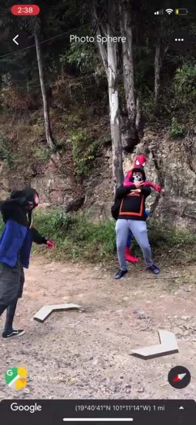 I found Spider-Man and Miles Moralez taking down a would-be car thief.