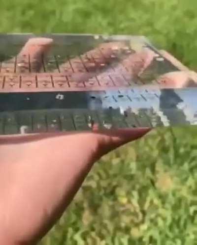 Glass periodic table with real elements inside it