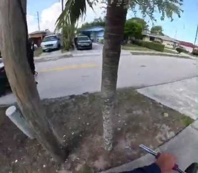Undercover cop tackles and arrests kid on a bike.