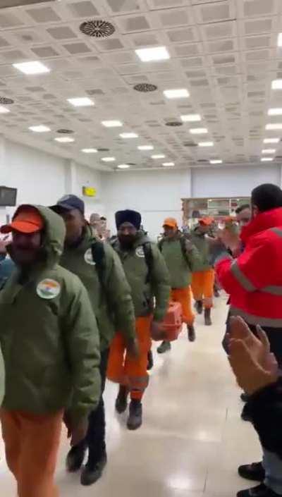 Indian search and rescue crew being greeted and bid farewell as they head back home from turkey