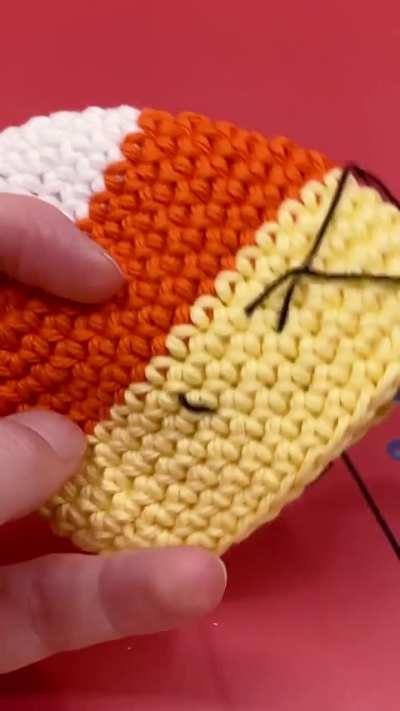 I crocheted candy corn to give out to the best costumes this Halloween