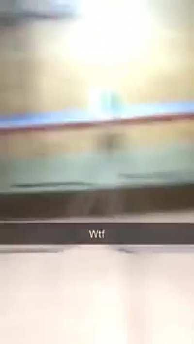 Kid throws ping pong paddle at his brother