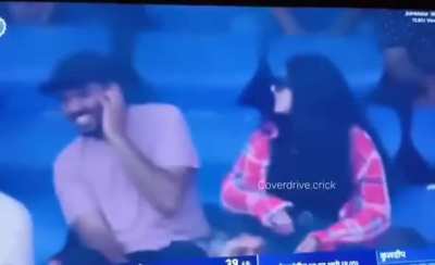 Woman caught assaulting her partner live on national television during a cricket match between India and West Indies