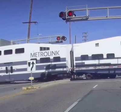 Car tried to Fast and Furious it’s way passed the train near my house