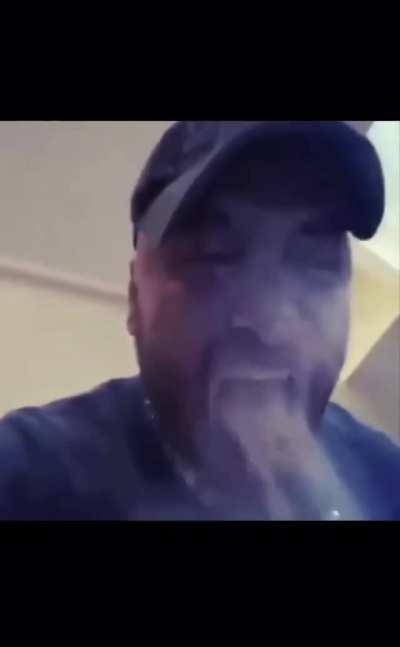 Bursting a fire extinguisher into mouth