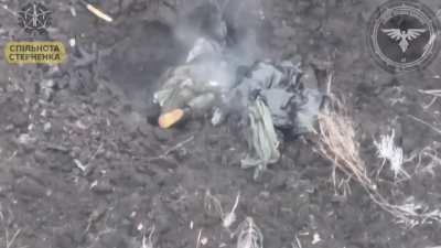 ruzzian soldier with two hand grenades.. being hit with FPV drone