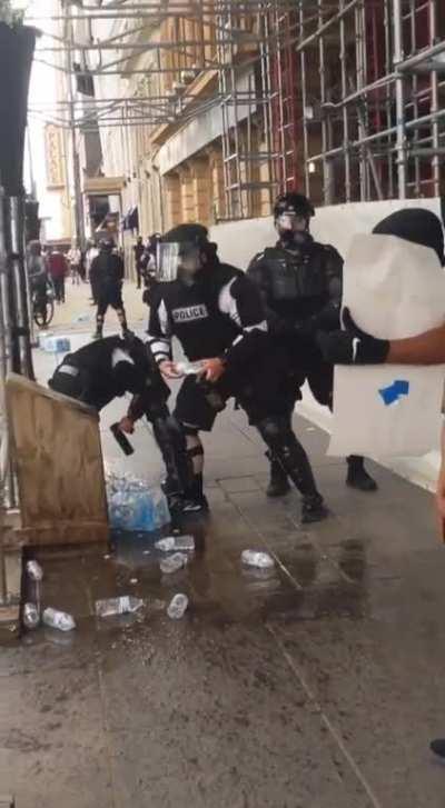 Video I captured of police dumping protestors water at yesterday's event.
