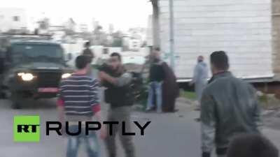 Israeli Soldier throw Disabled Palestinian off his wheel chair