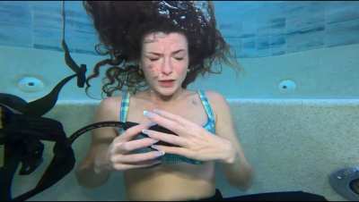 Underwater conversation by Nathalia