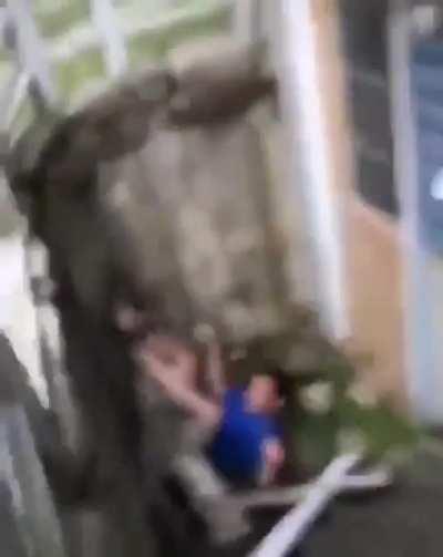 ... to sit on a wooden railing...