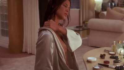 Rhona Mitra, who was the official live-action Lara Croft model earlier in her career, topless in 