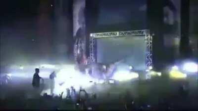 Kazuchika Okada makes his entrance holding a f*****g buster sword with a moving dinosaur at the entrance ramp.