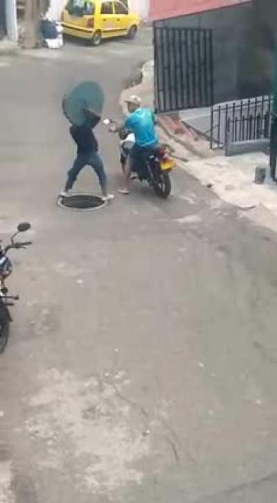 Trying to steal a manhole cover
