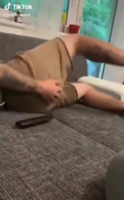 Trying to fart heavily.