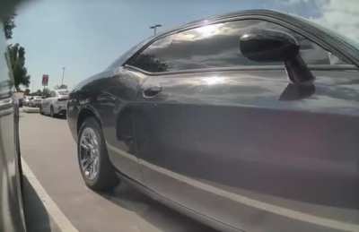 Women shakes her butt and opens her door into my Tesla. Left a nice ding