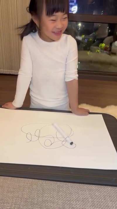 They scribble, she draws.