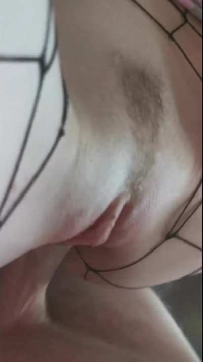 bulging out the front of her perfect pale pussy