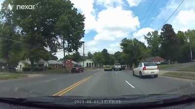 Truck hits Prius right in front of me and runs