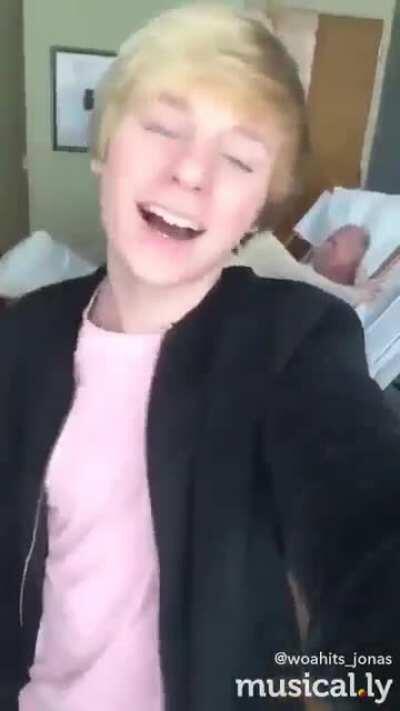 This kids's grandpa is actually dying while he is recording a musically, I did some research, and the grandpa died