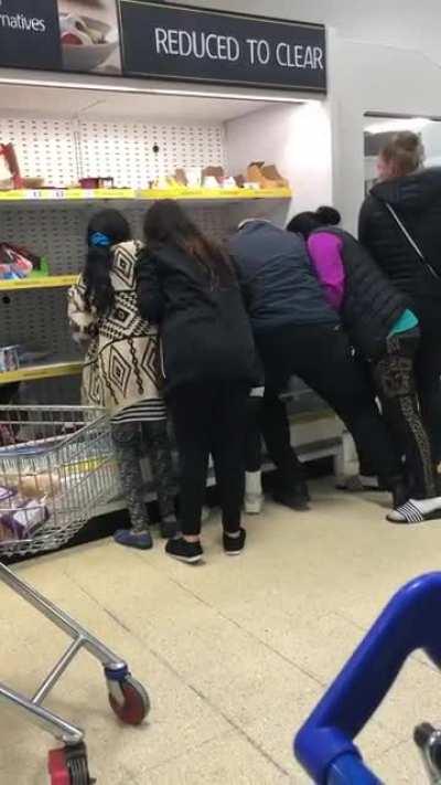 Shoppers fight for reduced price food items