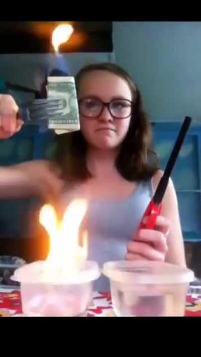 Burning a dollar bill