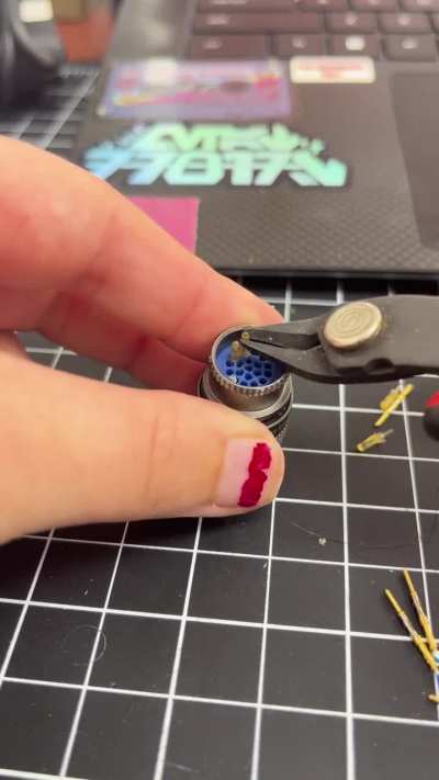 Plucking plastic plugs from pins