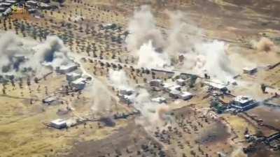 Exchange of artillery fire today between Syrian rebels and pro-Assad forces. Drone view of rebel side bombarding Dara Kebira village, S. Idlib front, Syria [July 17th, 2022]