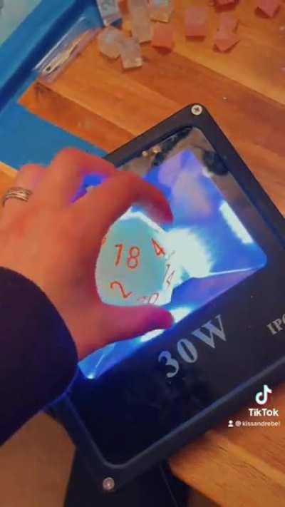 Made a portal themed chonk D20