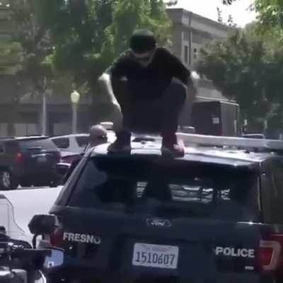 Vandalizing a police car