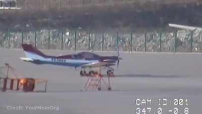 Wind carries away a parked airplane