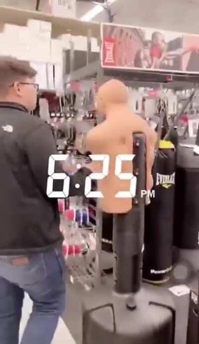 Trying to punch the dummy