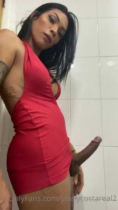 Shemale Hard Cock Bulging Through a Tight Dress