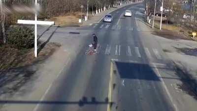 The centimeters between where his bike was and his body made the difference that saved his life