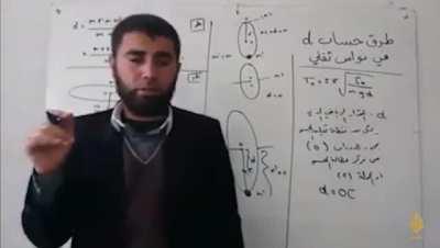 Syrian Physics Teacher giving a lecture while an Airstrike hits nearby