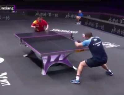 The way this ping pong player tricked his opponent by faking a shot