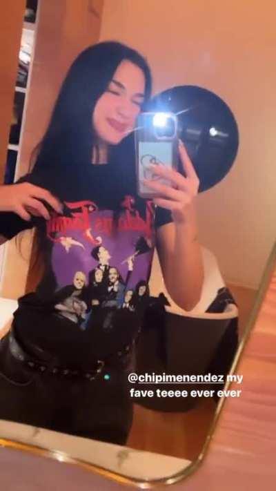 Looking cute in her Addams Family T-shirt