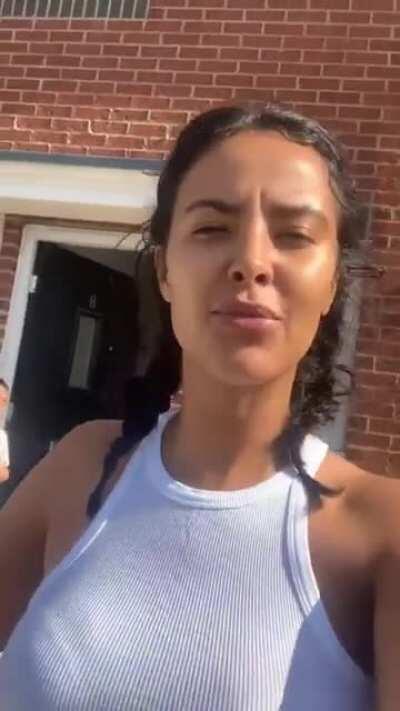 Bouncy in a white tank top (IG)