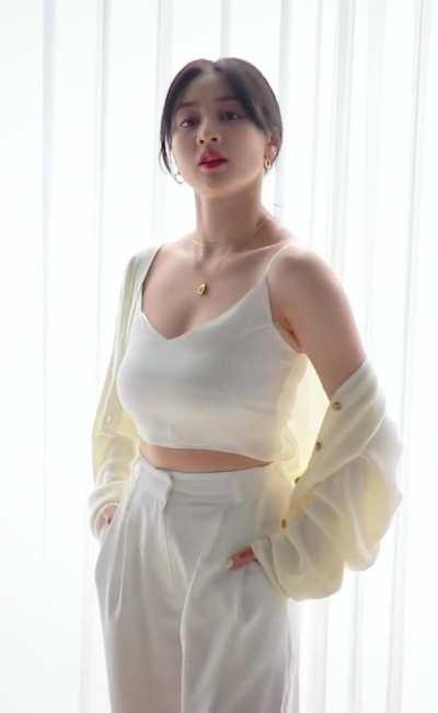 Jihyo - white pants, top, yellow sweater, yes I am Jihyo