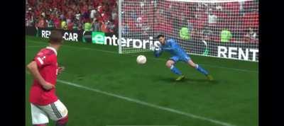 De Gea pulling his hands away from the ball and into his face in order to let the AI score