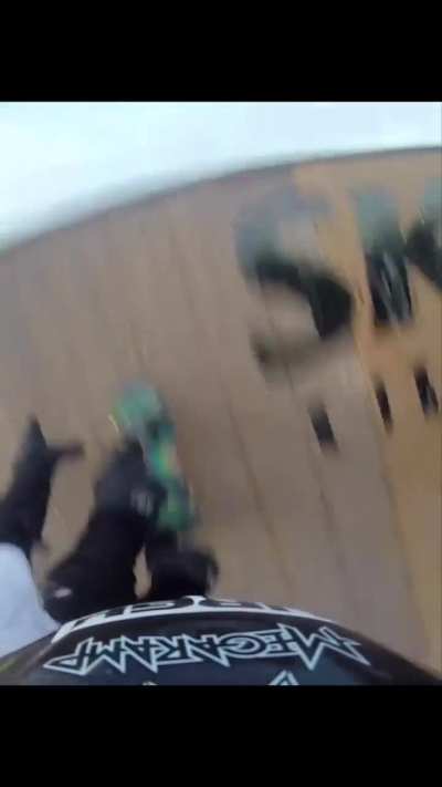 Swapping skateboards mid jump