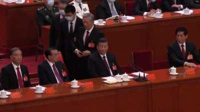 Close-up view of Hu Jintao getting kicked out. He tried to resist but realized it was over.