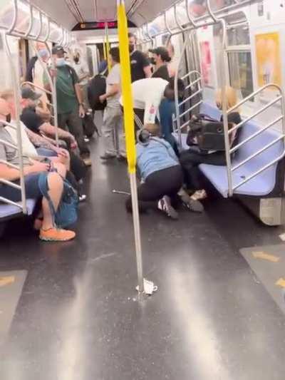 Lady attacks people on the subway