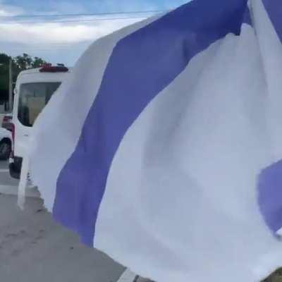 A van with the words “Hitler was right” & 