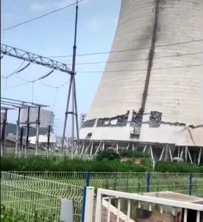 Demolishing a cooling tower of a nuclear power plant