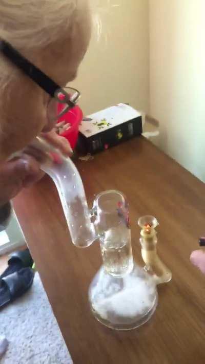 82 year old grandma smoking a bong