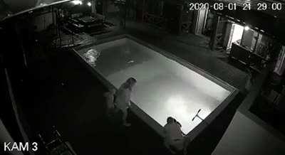 A 7 year old girl jumps in the pool to save a younger kid