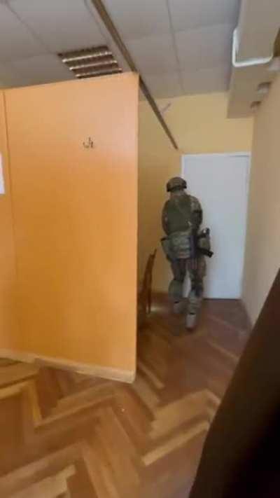 Ukrainians clearing a building. He caught me by complete surprise