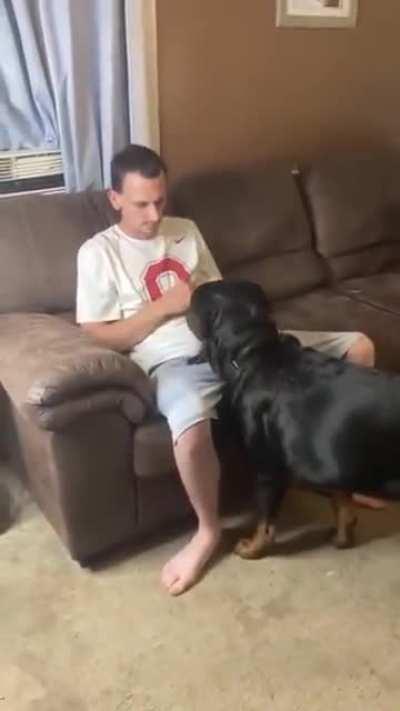 Just another day clipping his dog's nails..